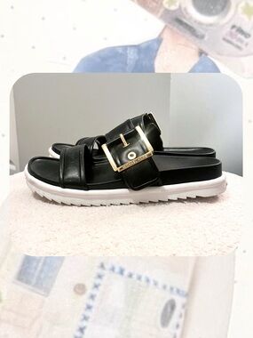 Michael Kors Black Colby Slide Sandals with Gold Accent Buckles & White Sole